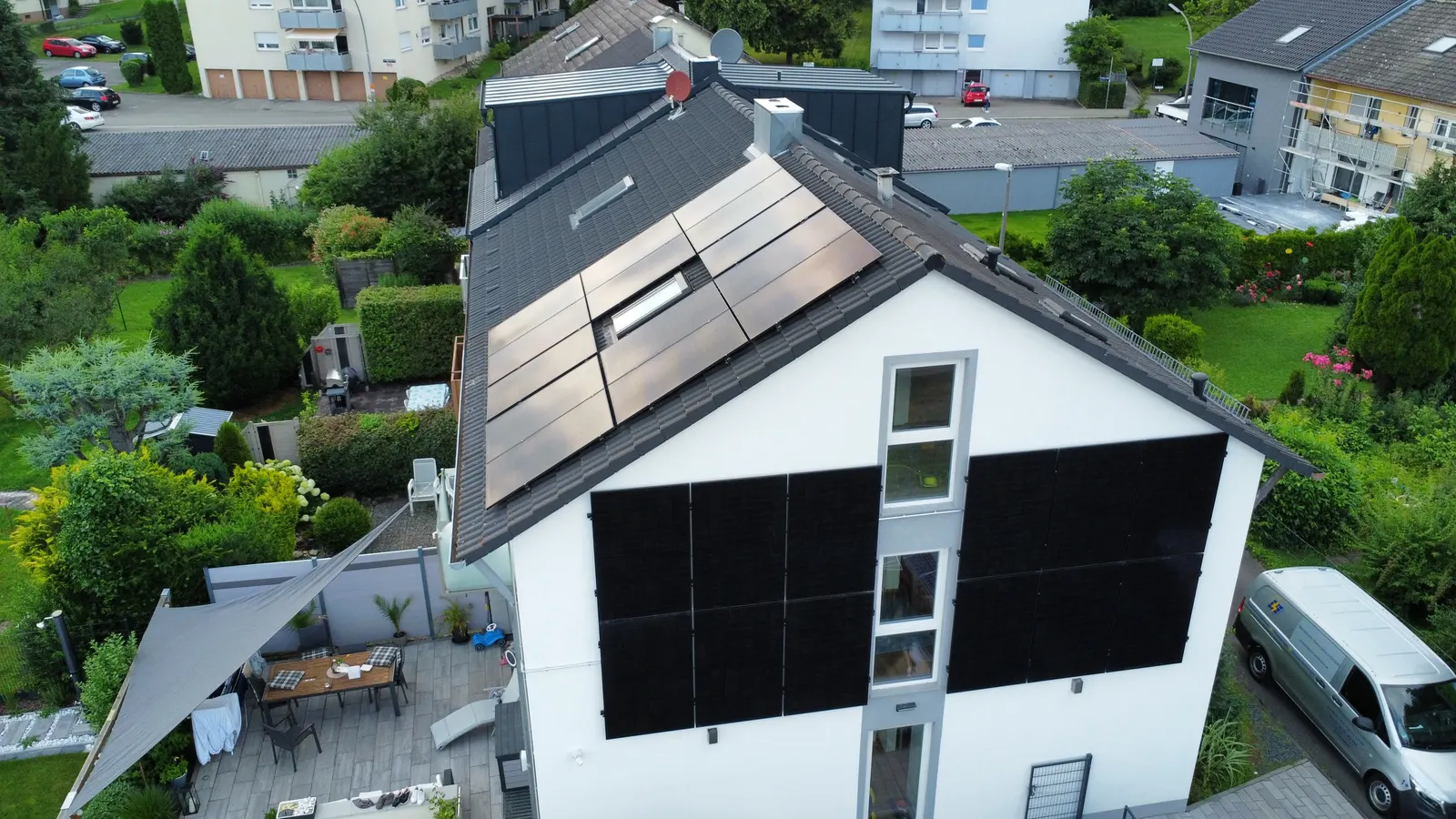 Photovoltaic modules on the roof and facade of a home