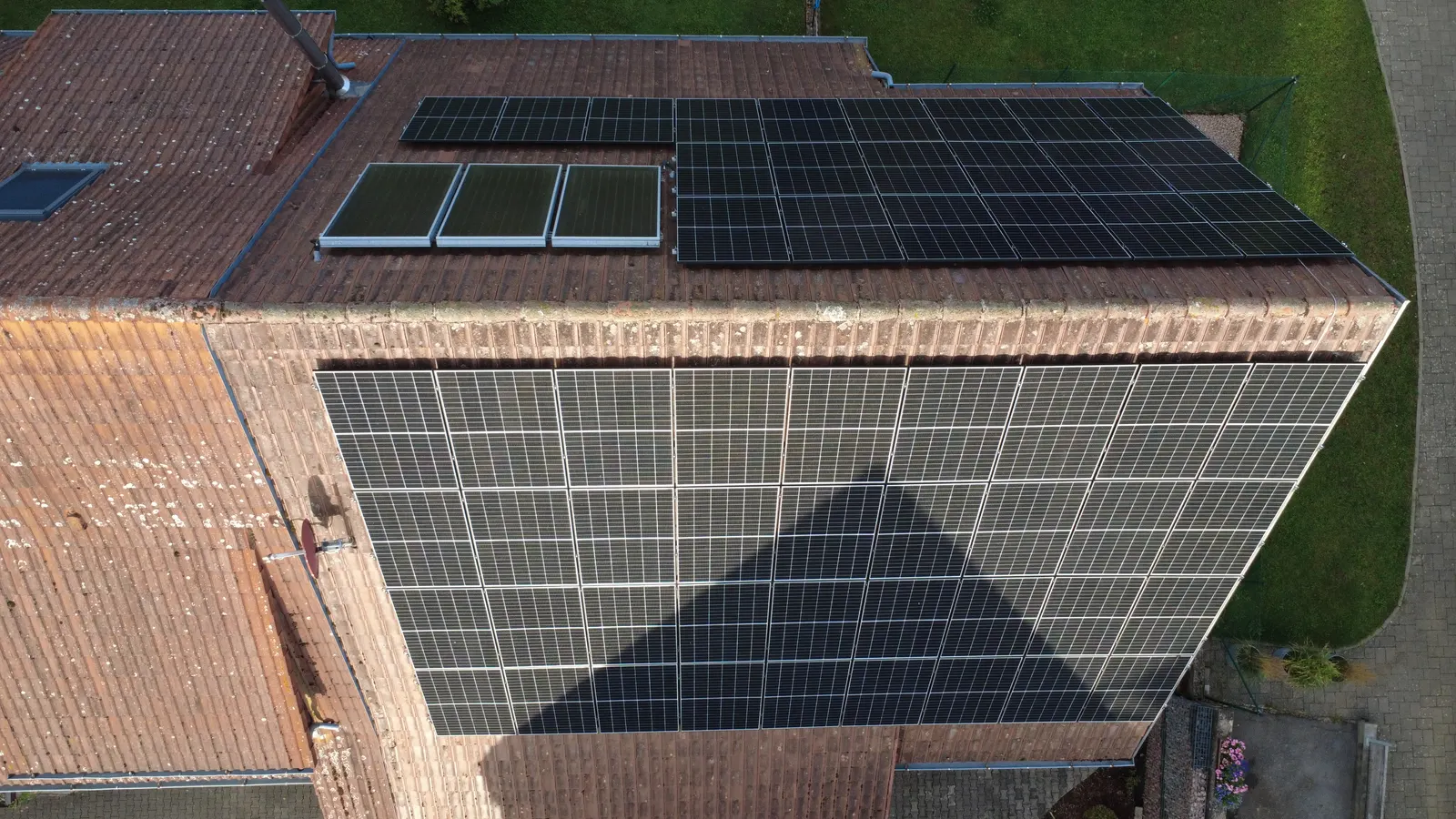 Large roof area with photovoltaics and solar thermal collectors
